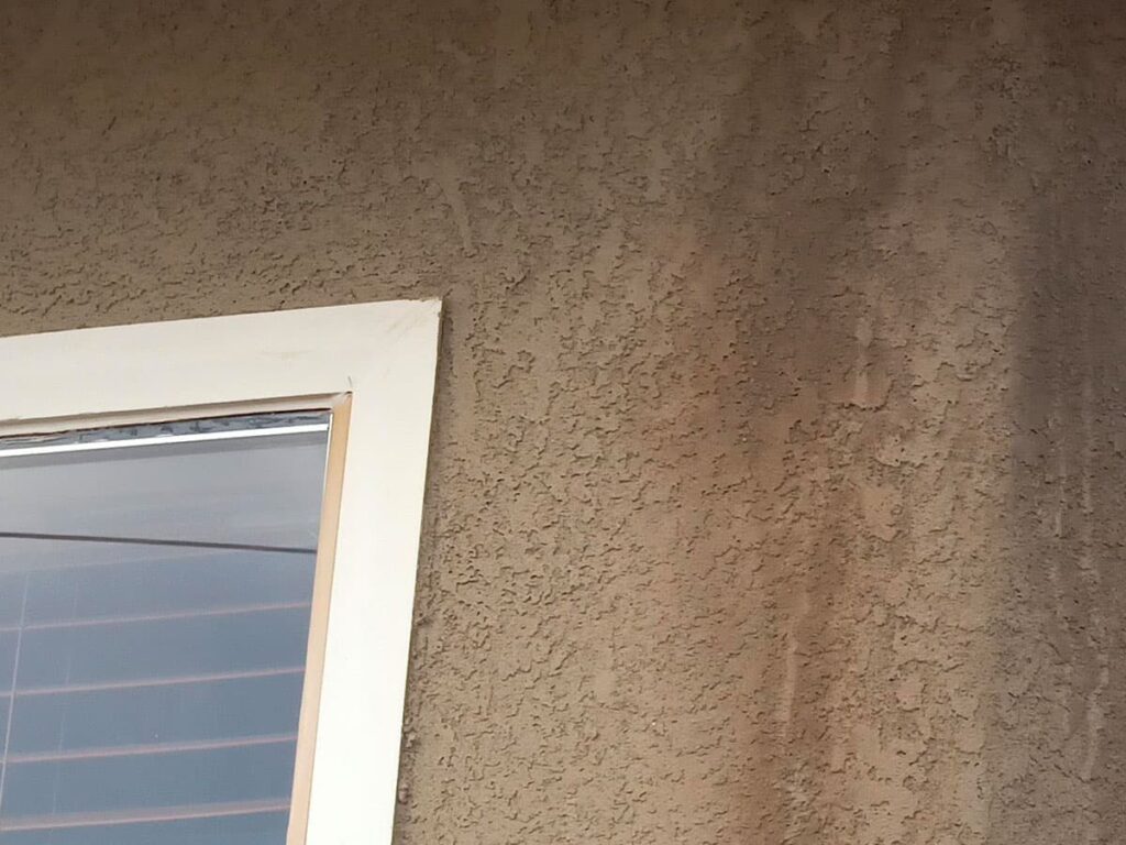 DISCOLORATION AND STAINING ON EXTERIOR STUCCO